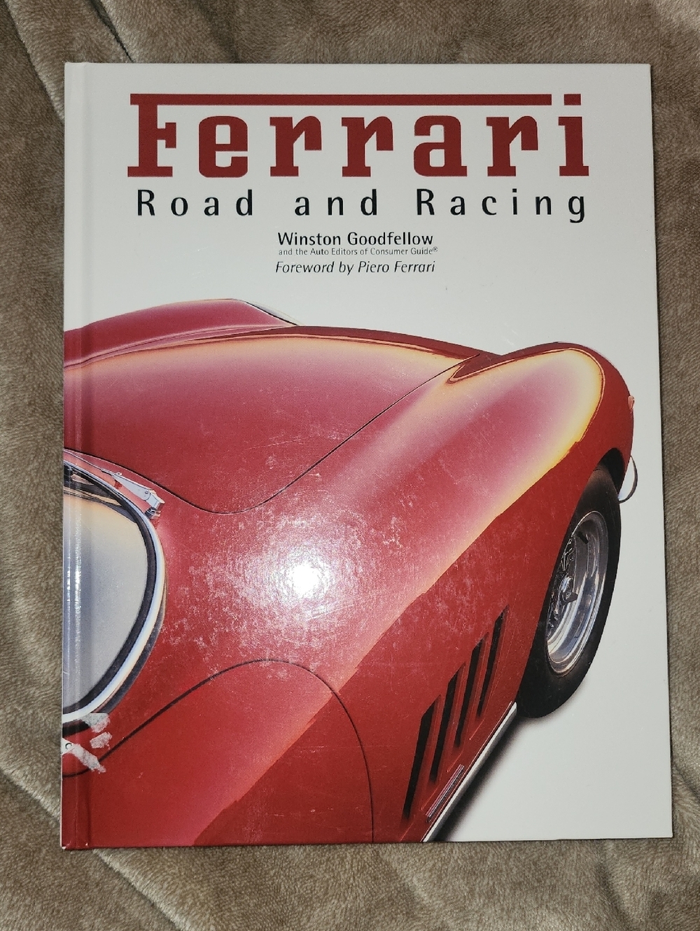 Ferrari Hardcover Book with Red Sportscar Cover